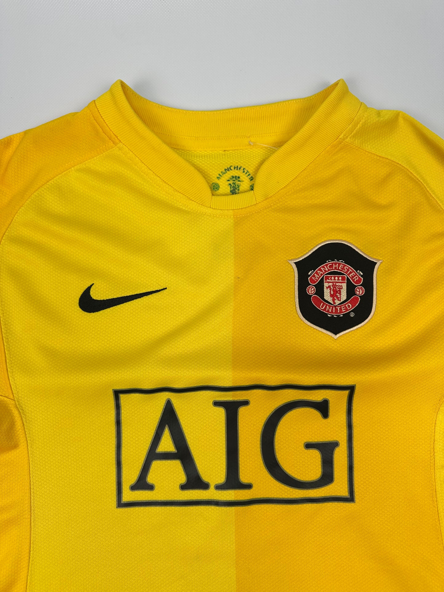 Vintage Nike Manchester United Fußballtrikot gelb L Kids