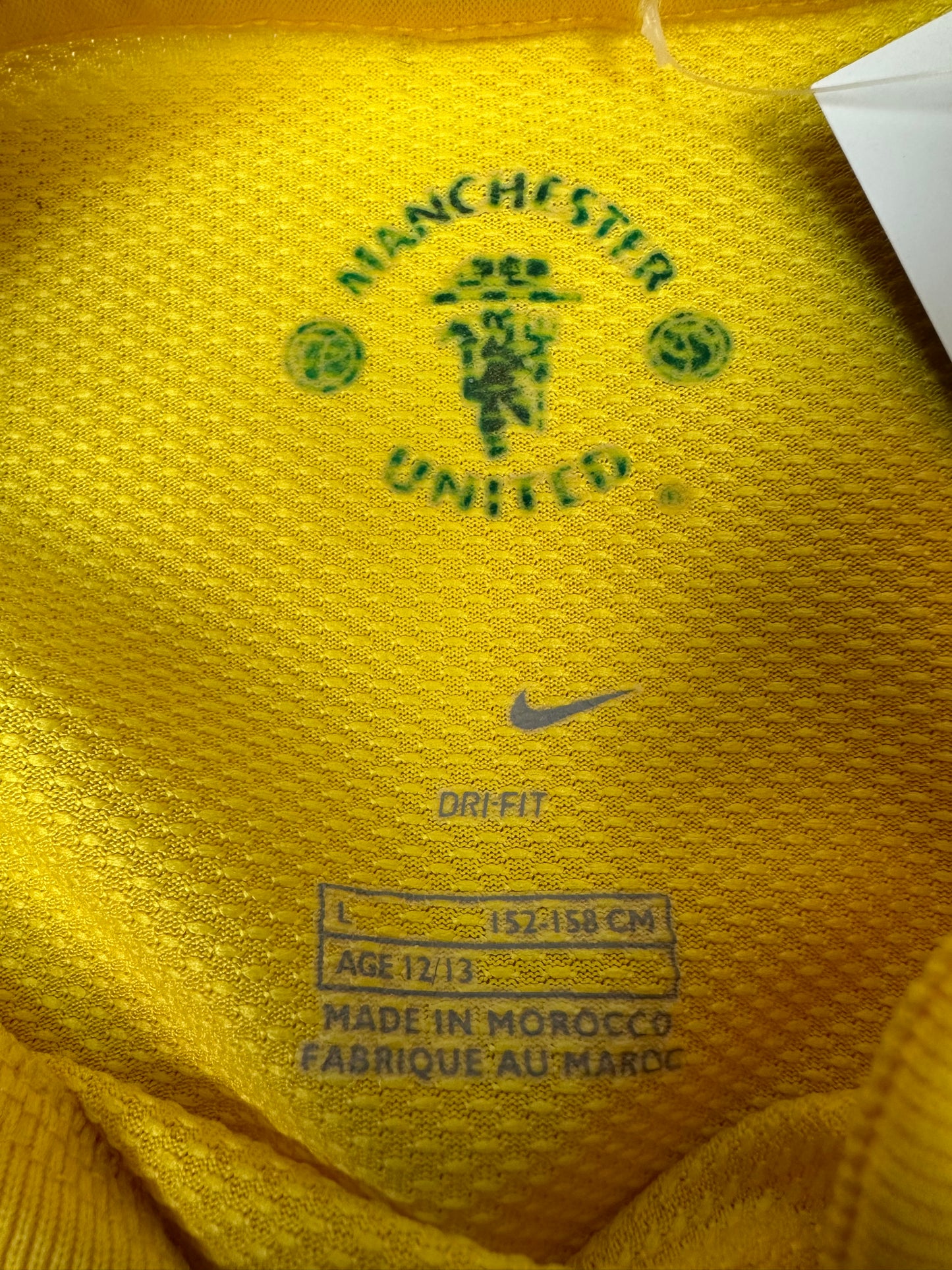 Vintage Nike Manchester United Fußballtrikot gelb L Kids